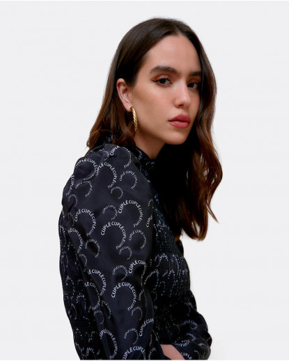 VESTIDO MINI ENGOMADO CREP SERIGRAFÍA...